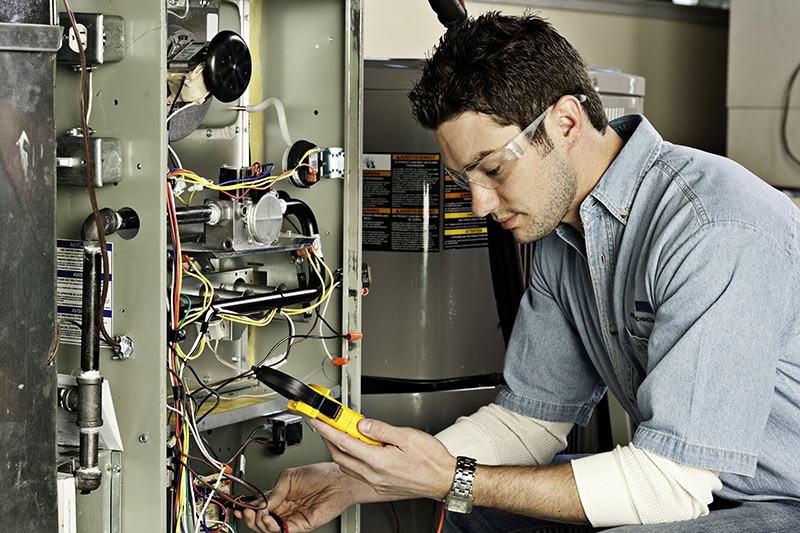 Technician Working on Unit.